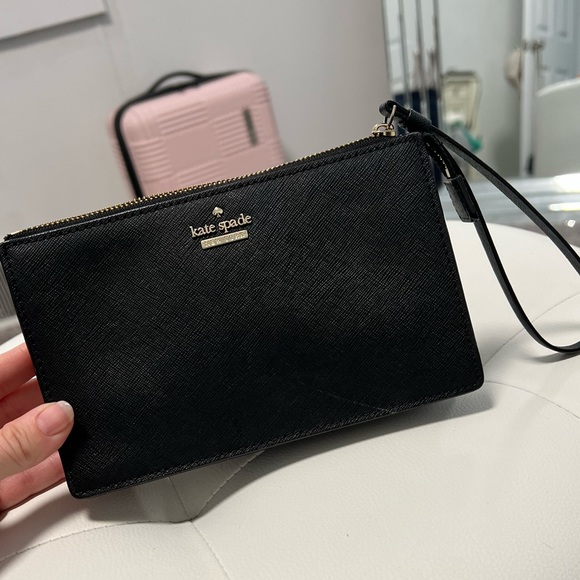 kate spade Handbags - KATE SPADE BLACK AND GOLD WRISTLET